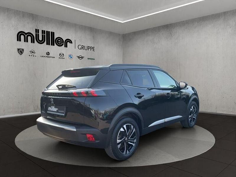 Gebraucht Peugeot e-2008 Allure 100 kW (136 PS) 2021 Perla nera schwarz SUV