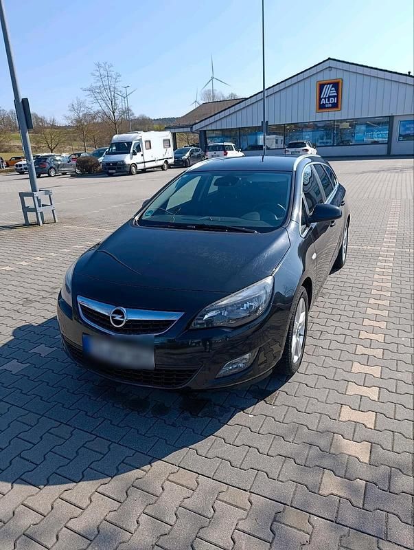 Gebraucht Opel Astra 125 PS (91 kW) 2012 Schwarz Kombi