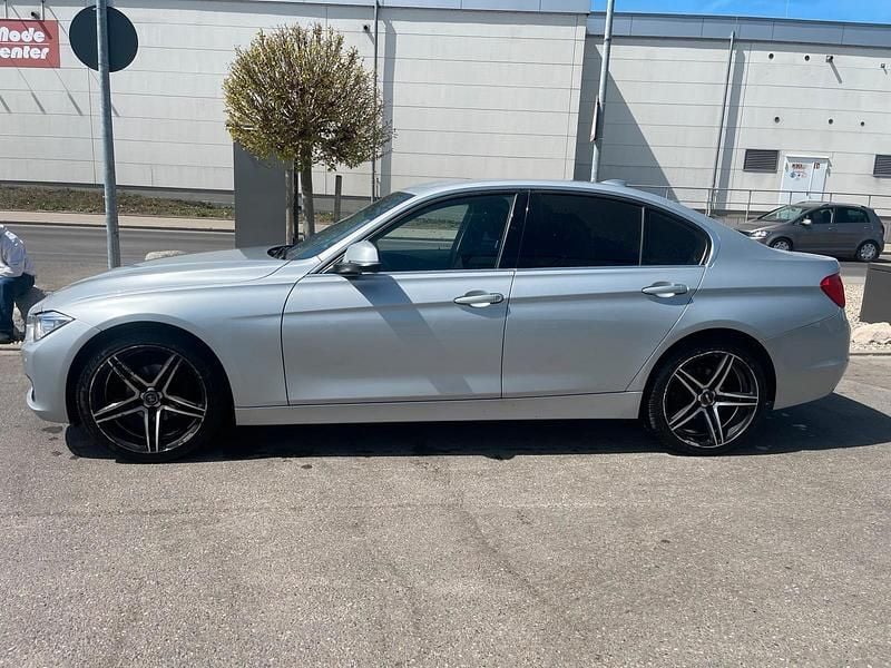 Second-hand BMW 318 143 CP (105 kW) 2013 Argintiu Berlinǎ