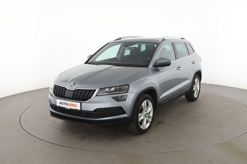 Grau Gebraucht 2018 Skoda Karoq Style SUV | 22.490 € (Fairer Preis) - Bild 1/4