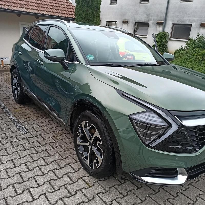 Grün Gebraucht 2022 Kia Sportage 2 SUV | 25.500 € (Etwas zu teuer) - Bild 1/4