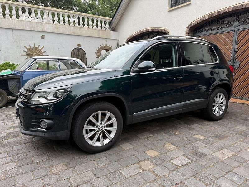 Grün Gebraucht 2011 VW Tiguan Sportline SUV | 7.990 € (Guter Preis) - Bild 1/4