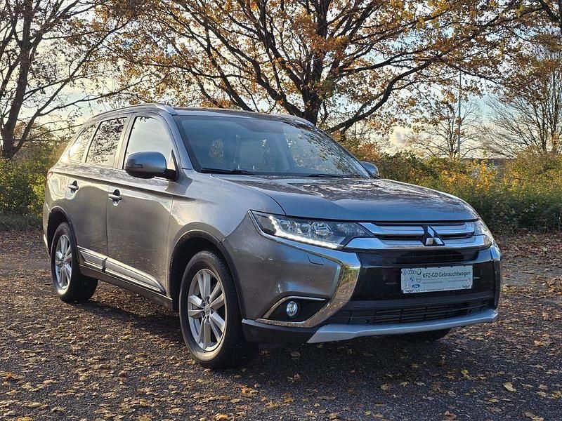 Grau Gebraucht 2015 Mitsubishi Outlander Top SUV | 15.190 € (Fairer Preis) - Bild 1/4