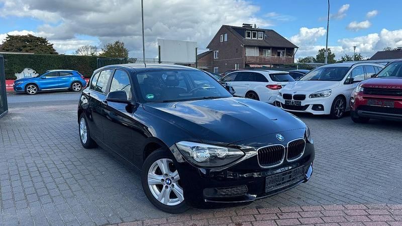 Schwarz Gebraucht 2012 BMW 116 Sport Line Kleinwagen | 6.400 € (Fairer Preis) - Bild 1/4