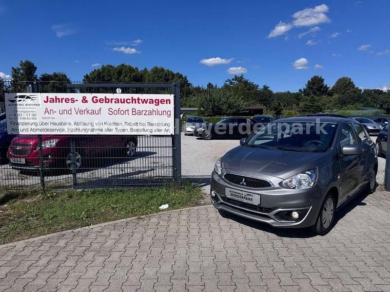 Grau Gebraucht 2017 Mitsubishi Space Star Diamant Edition Kleinwagen | 7.499 € (Fairer Preis) - Bild 1/4