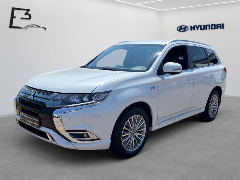 Weiß Gebraucht 2018 Mitsubishi Outlander P-HEV Edition SUV | 19.990 € (Guter Preis) - Bild 1/4