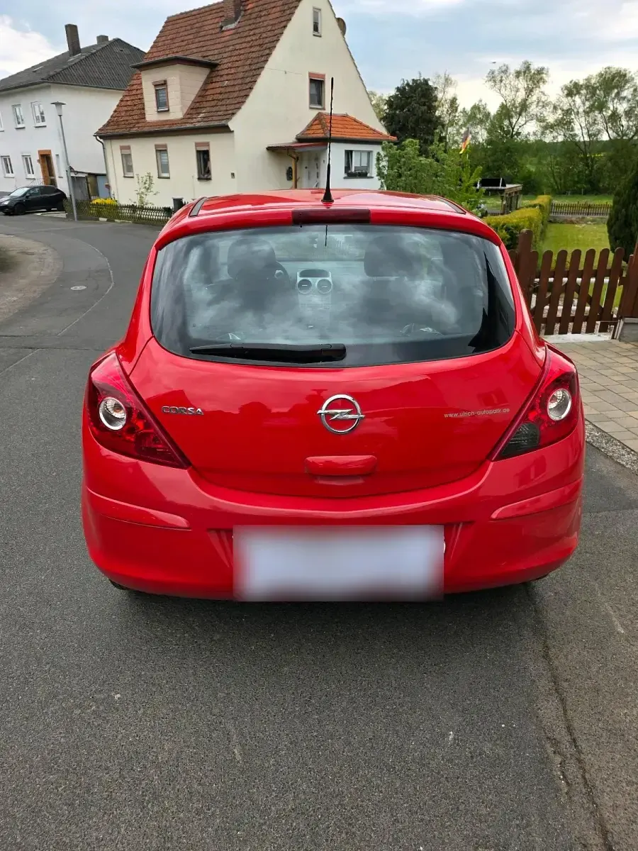 Używany Opel Corsa 101 KM (74 kW) 2013 Czerwony Hatchback
