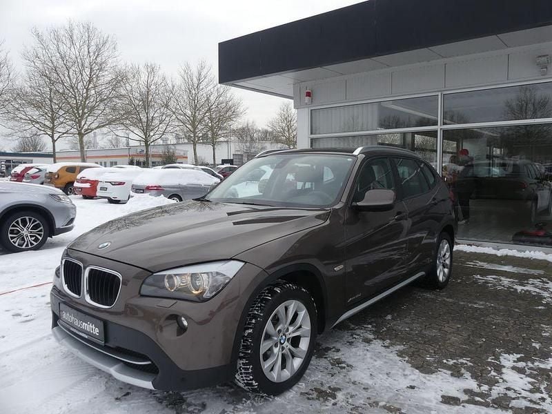 Braun Gebraucht 2012 BMW X1 Performance SUV | 14.990 € (Teuer) - Bild 1/4