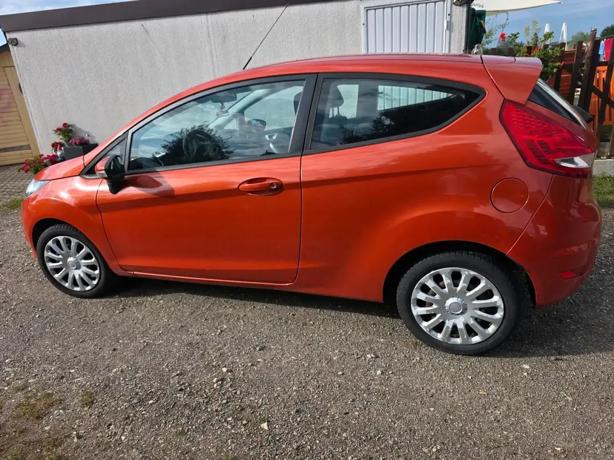 Gebraucht Ford Fiesta 2011 Orange Kleinwagen