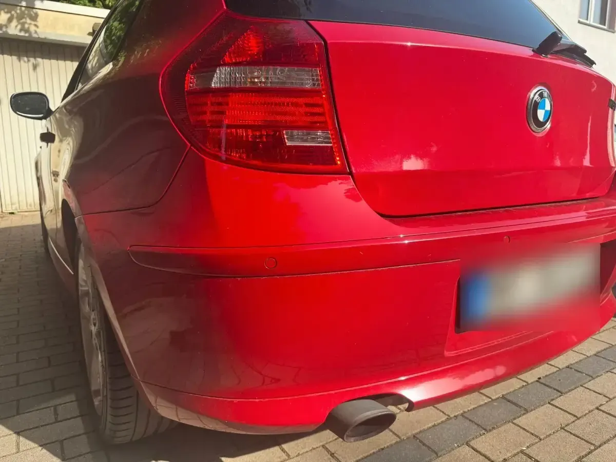 Gebraucht BMW 116 122 PS (89 kW) 2010 Rot Kleinwagen