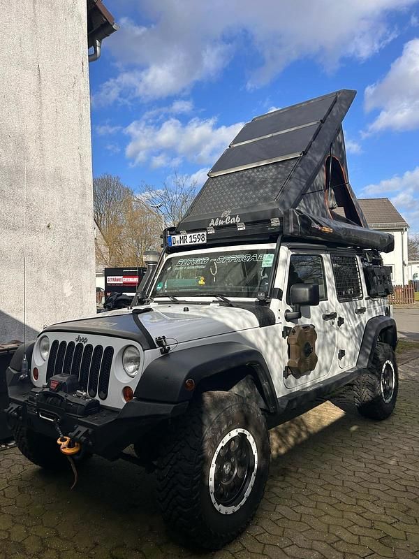 Weiß Gebraucht 2012 Jeep Wrangler SUV | 36.999 € - Bild 1/4