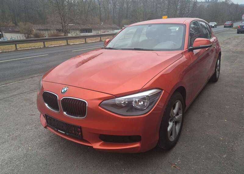 Valencia orange metallic Gebraucht 2013 BMW 116 Kleinwagen | 8.990 € (Fairer Preis) - Bild 1/4