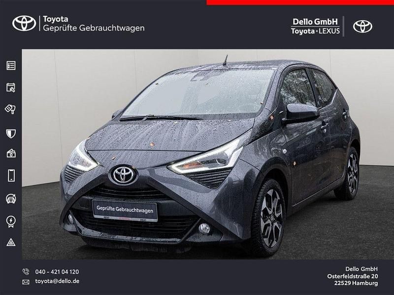 Grau Gebraucht 2021 Toyota Aygo Team Kleinwagen | 11.990 € (Fairer Preis) - Bild 1/4