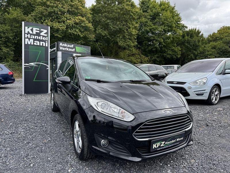 Schwarz Gebraucht 2013 Ford Fiesta Titanium Kleinwagen | 6.990 € (Fairer Preis) - Bild 1/4