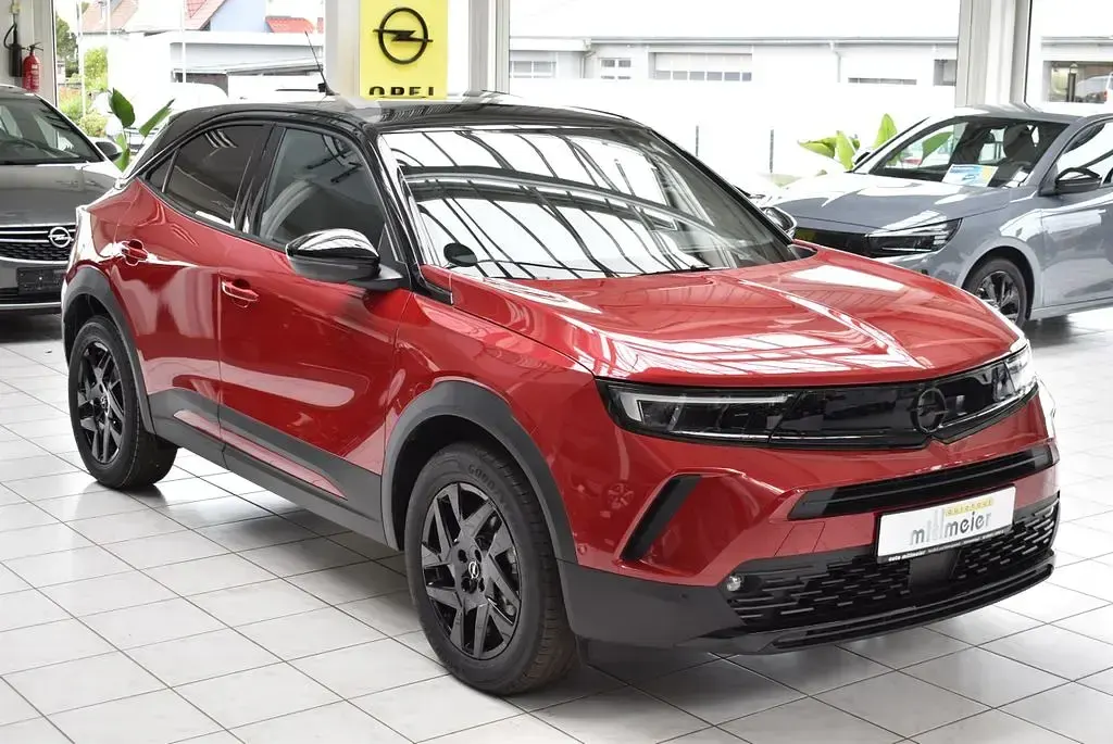 Gebraucht Opel Mokka-e 100 kW (136 PS) 2024 Rot kosmos rot met. SUV