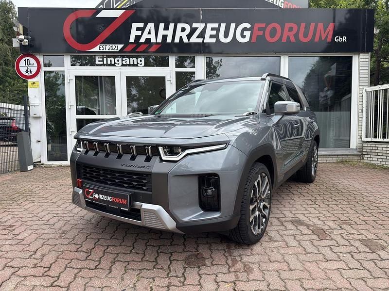 Grau Gebraucht 2024 Ssangyong Torres SUV | 32.900 € - Bild 1/4