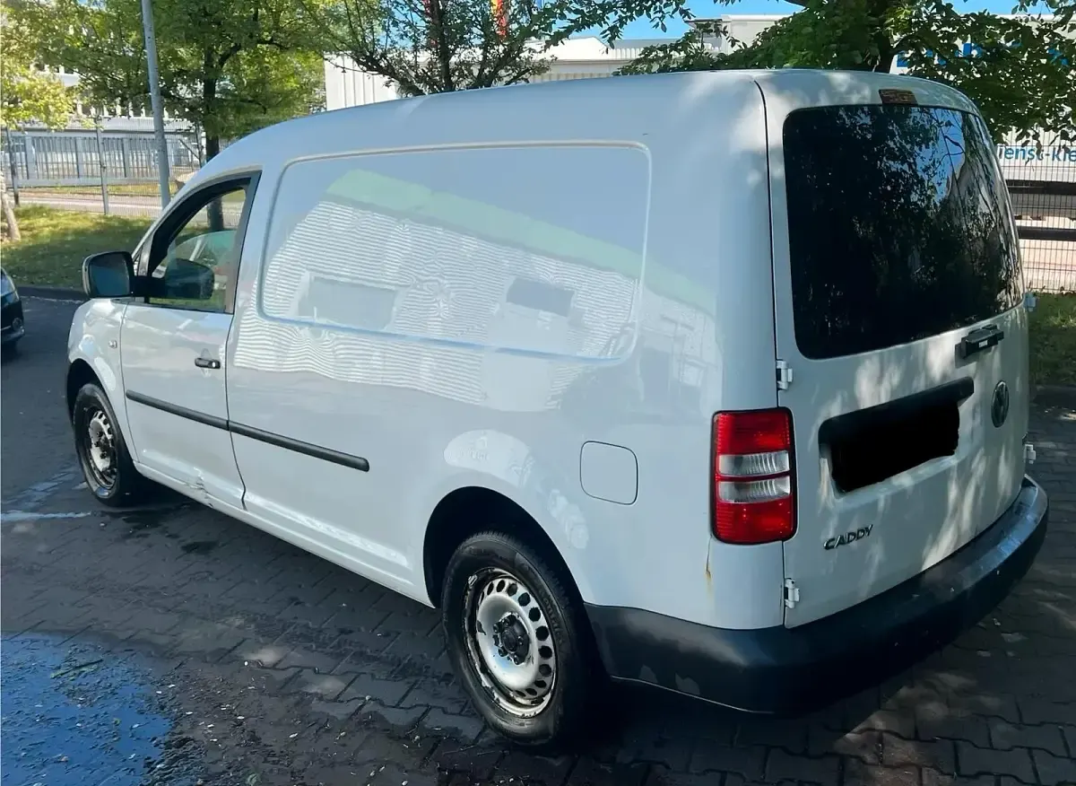 Używany VW Caddy 105 KM (77 kW) 2014 Biały Minivan