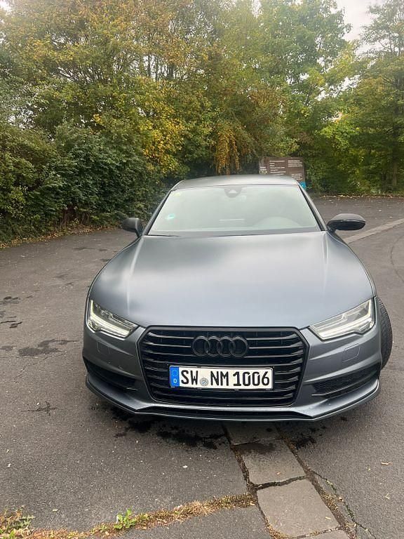 Grün Gebraucht 2018 Audi A7 Sportback Sport Kleinwagen | 27.050 € (Guter Preis) - Bild 1/4