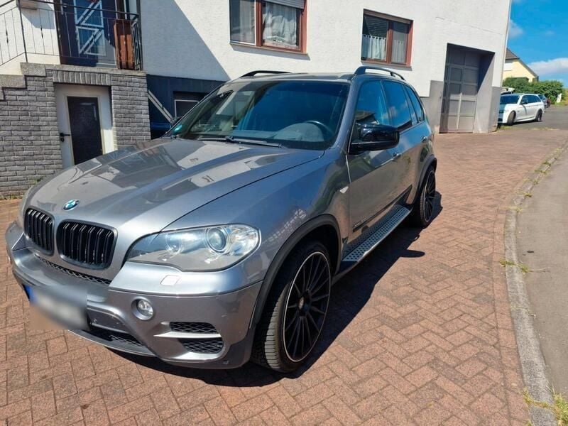 Grau Gebraucht 2011 BMW X5 Performance SUV | 14.500 € - Bild 1/4