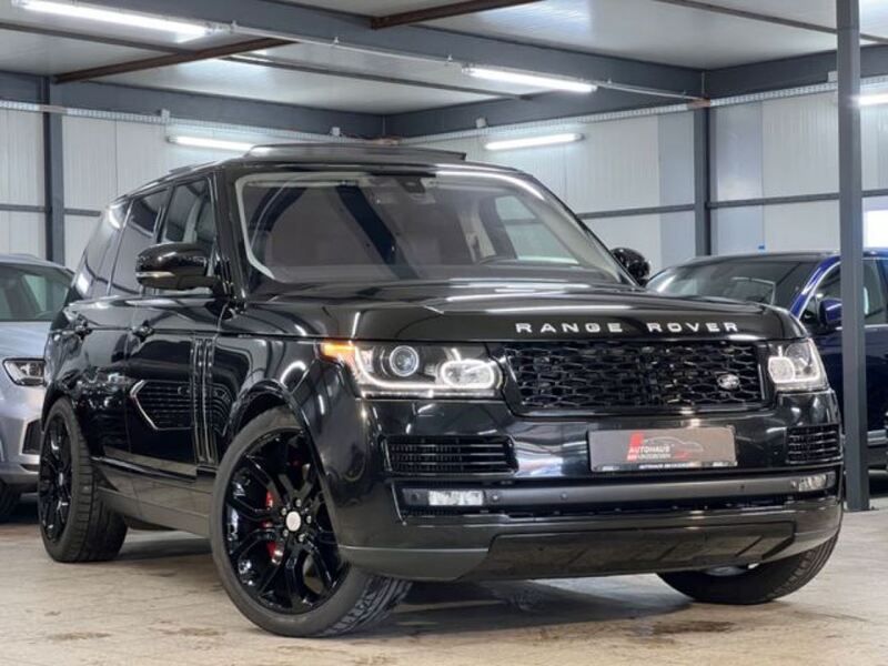 Schwarz santorini black Gebraucht 2014 Land Rover Range Rover Vogue SUV | 43.690 € - Bild 1/4