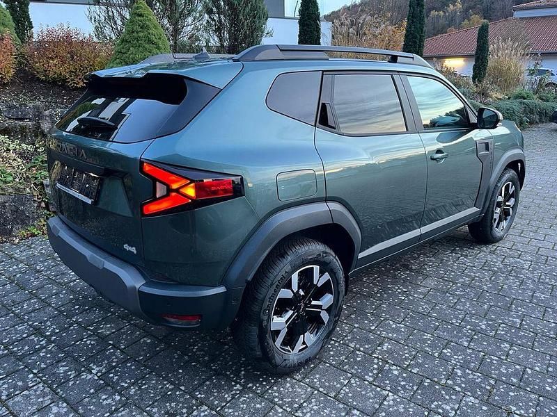 Grün Neu 2025 Dacia Duster Extreme SUV | 27.890 € (Etwas zu teuer) - Bild 1/4
