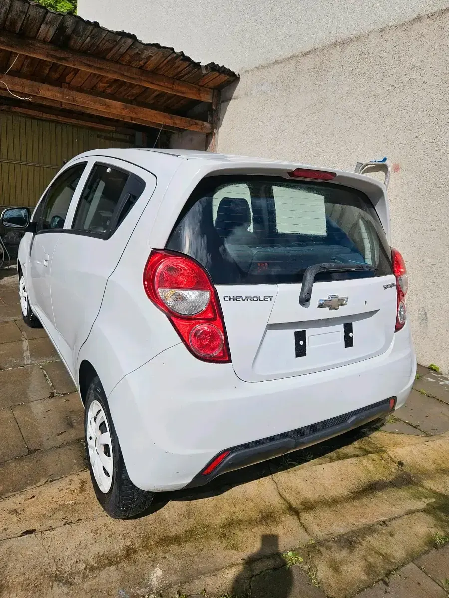 Gebraucht Chevrolet Spark 69 PS (50 kW) 2013 Weiß Kleinwagen