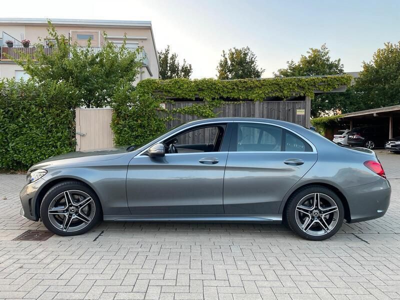 Grau Gebraucht 2021 Mercedes C180 AMG Limousine | 31.499 € (Fairer Preis) - Bild 1/4