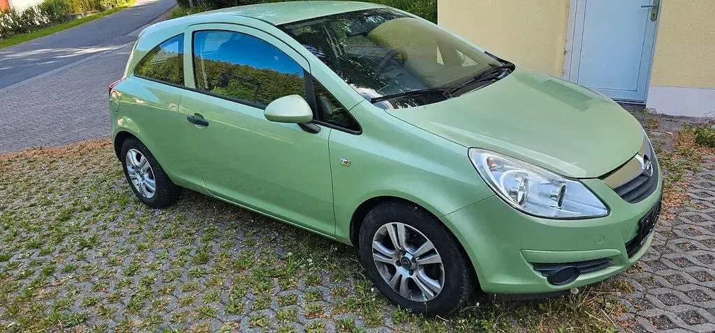 Gebraucht Opel Corsa 70 PS (51 kW) 2010 Grün Kleinwagen