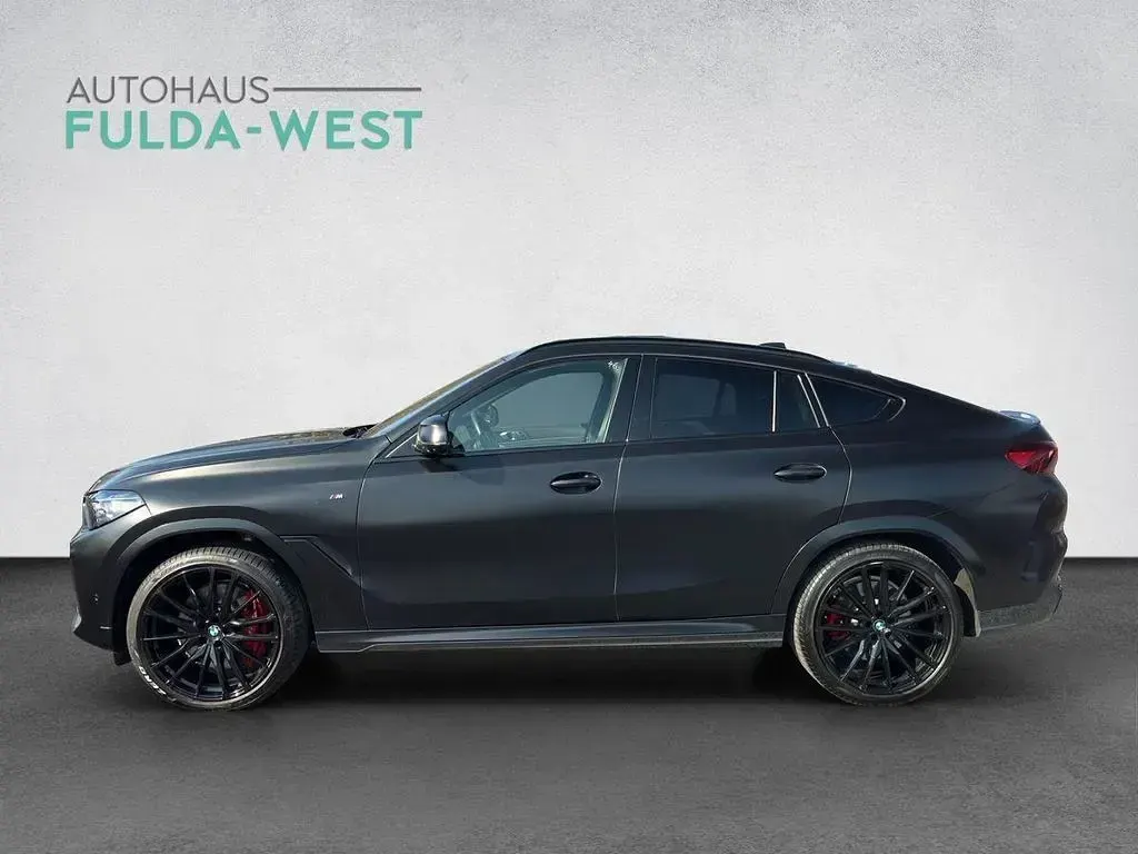 Gebraucht BMW X6 M50 Performance 530 PS (389 kW) 2022 Frozen black SUV