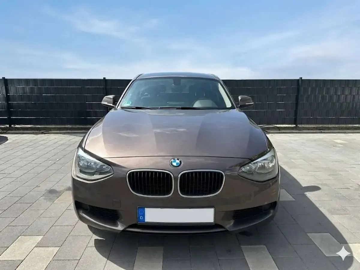 Gebraucht BMW 114 102 PS (75 kW) 2014 Braun Kleinwagen