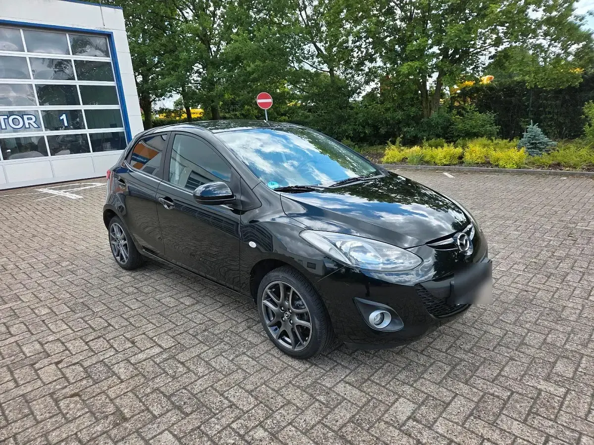 Gebraucht Mazda 2 84 PS (61 kW) 2014 Schwarz Kleinwagen