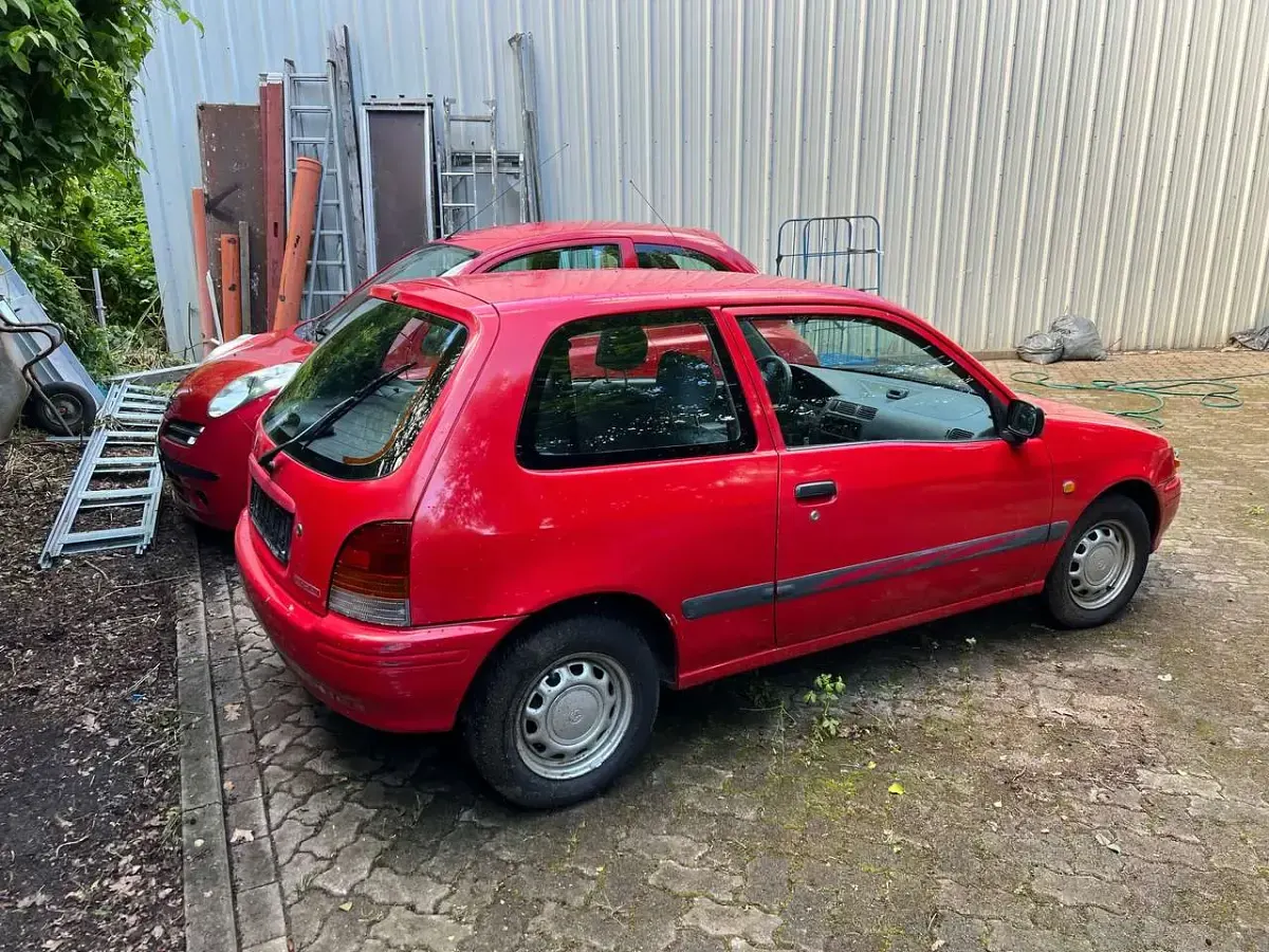 Gebraucht Toyota Starlet 75 PS (55 kW) 1997 Rot Kleinwagen