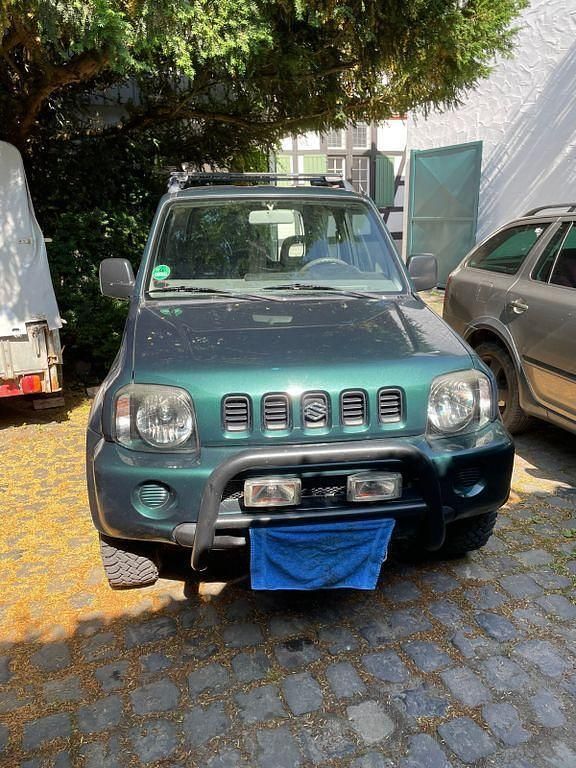 Grün Gebraucht 2000 Suzuki Jimny SUV | 5.500 € (Fairer Preis) - Bild 1/4