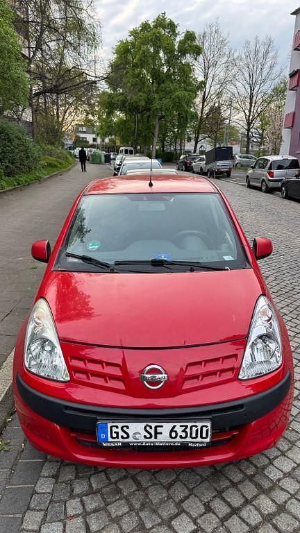 Gebraucht Nissan Pixo Acenta 68 PS (50 kW) 2011 Rot Kleinwagen