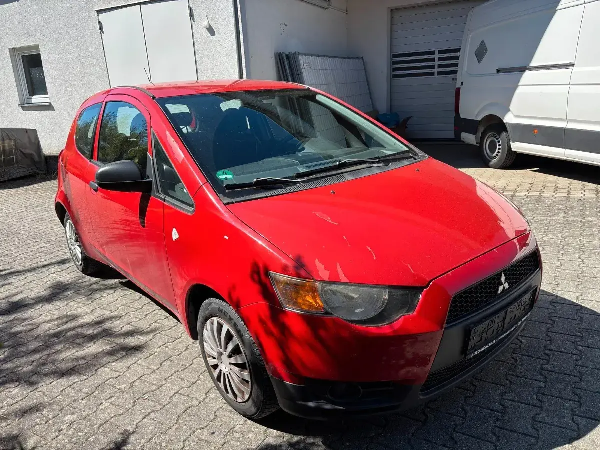 Gebraucht Mitsubishi Colt Basis 75 PS (55 kW) 2009 Rot Kleinwagen