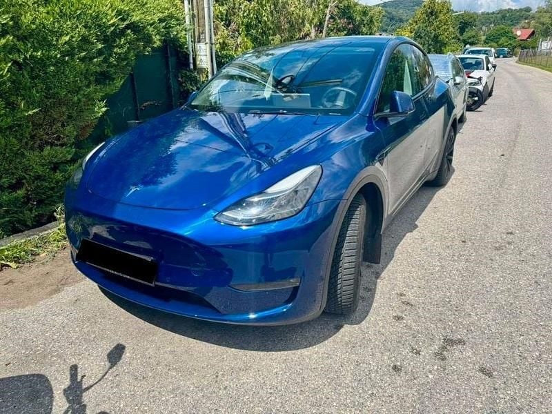 Blau Gebraucht 2021 Tesla Model Y SUV | 22.000 € - Bild 1/4