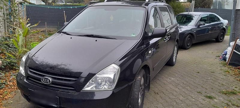 Schwarz Gebraucht 2009 Kia Carnival 2 Van / Kleinbus | 902 € (Guter Preis) - Bild 1/4