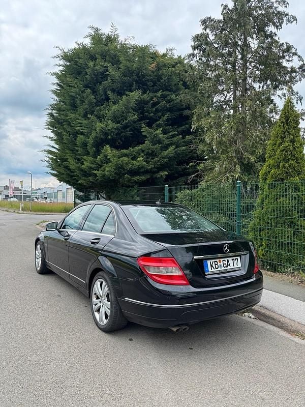 Schwarz Gebraucht 2009 Mercedes C200 Limousine | 7.099 € - Bild 1/4