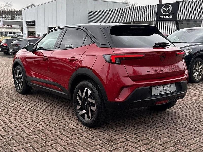 Gebraucht Opel Mokka 131 PS (96 kW) 2024 Lackierung rot rubi/typ aussen SUV