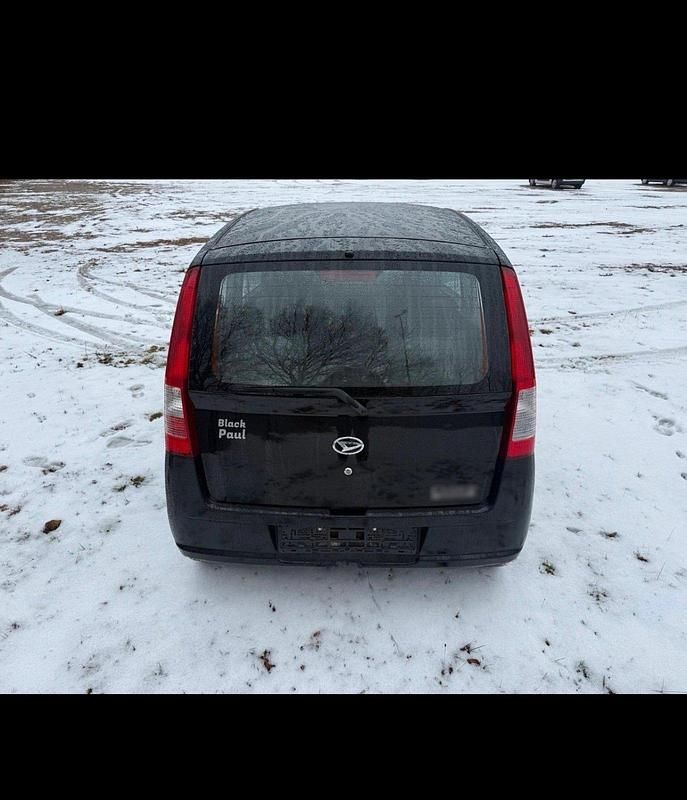 Gebraucht Daihatsu Cuore 59 PS (43 kW) 2006 Schwarz Kleinwagen