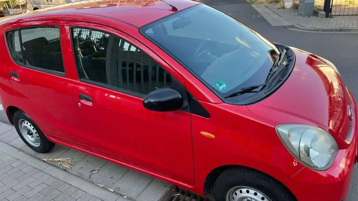 Gebraucht Daihatsu Cuore Plus 58 PS (42 kW) 2008 Rot Kleinwagen