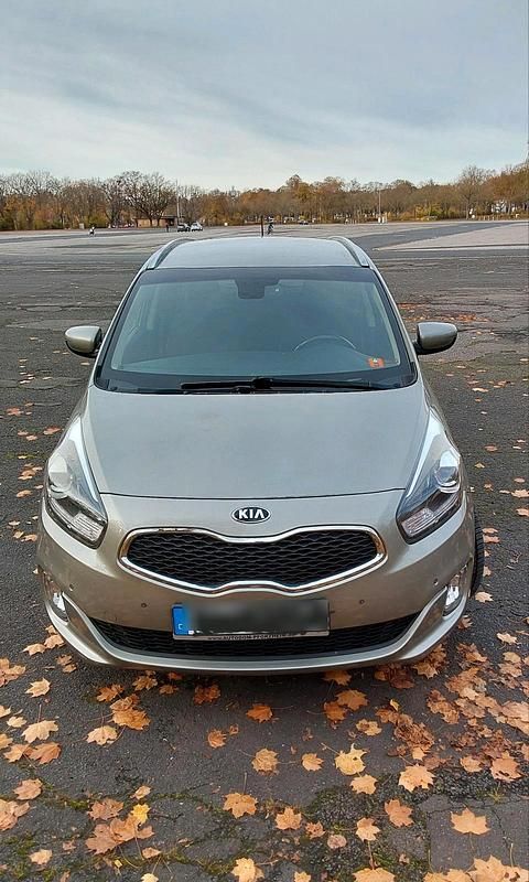 Grau Gebraucht 2014 Kia Carens Van / Kleinbus | 6.999 € (Fairer Preis) - Bild 1/4