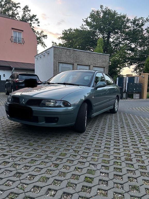 Grün Gebraucht 2004 Mitsubishi Carisma Motion Limousine | 1.750 € (Fairer Preis) - Bild 1/4