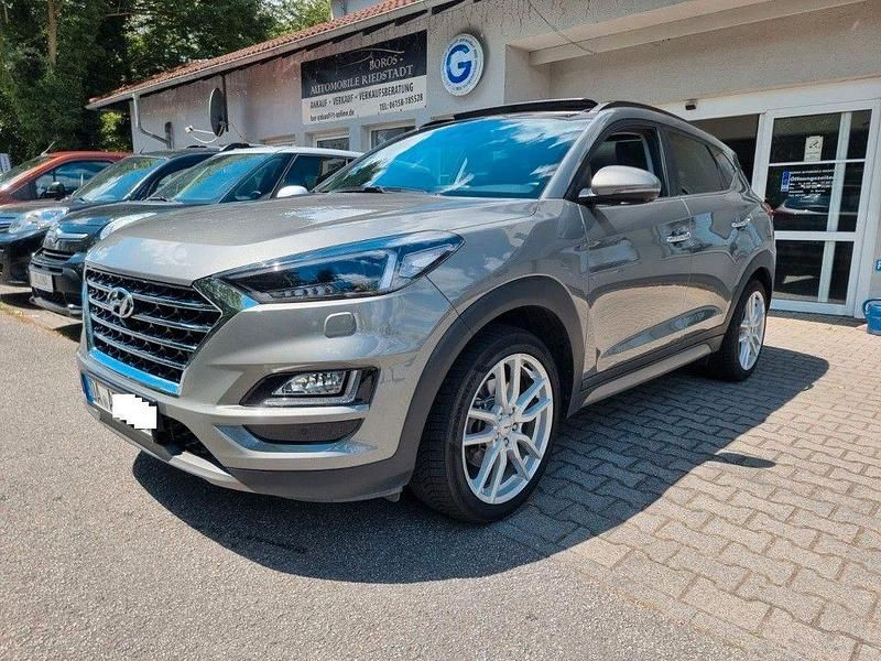 Grau Gebraucht 2018 Hyundai Tucson Premium SUV | 20.500 € (Fairer Preis) - Bild 1/4