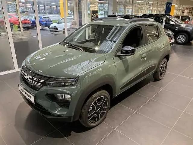 Olivgrau (metallic) Gebraucht 2022 Dacia Spring Expression Kleinwagen | 12.990 € (Fairer Preis) - Bild 1/4