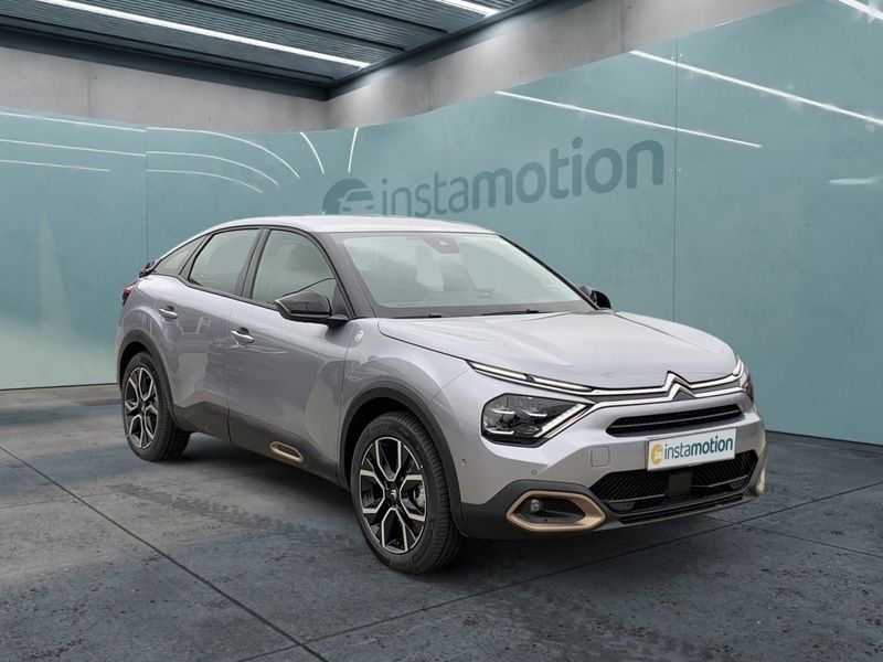 Grau Gebraucht 2022 Citroën e-C4 Feel Limousine | 25.770 € (Teuer) - Bild 1/3