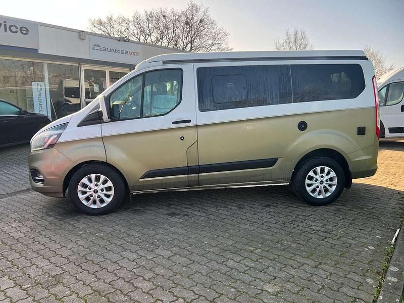 Gebraucht Ford Transit Custom Nugget 185 PS (136 kW) 2022 Frozen white teilfoliert Van / Kleinbus