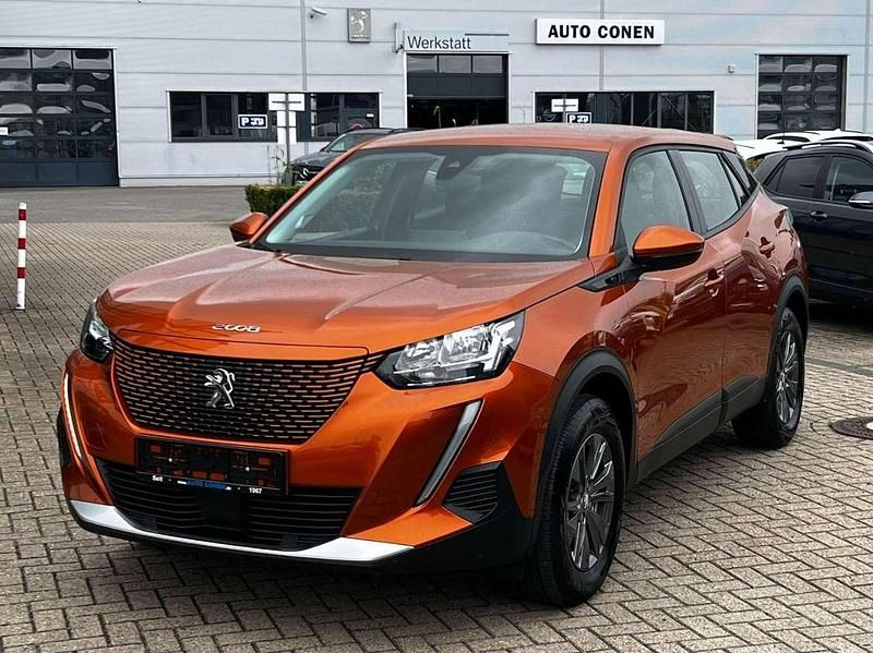 Orange fusion (metallic) Gebraucht 2021 Peugeot e-2008 Active SUV | 16.290 € (Guter Preis) - Bild 1/4