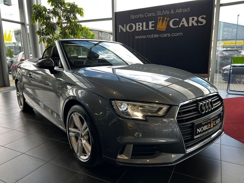 Monsungrau metallic (metallic) Gebraucht 2018 Audi A3 Cabriolet Sport Cabrio | 28.290 € (Teuer) - Bild 1/4