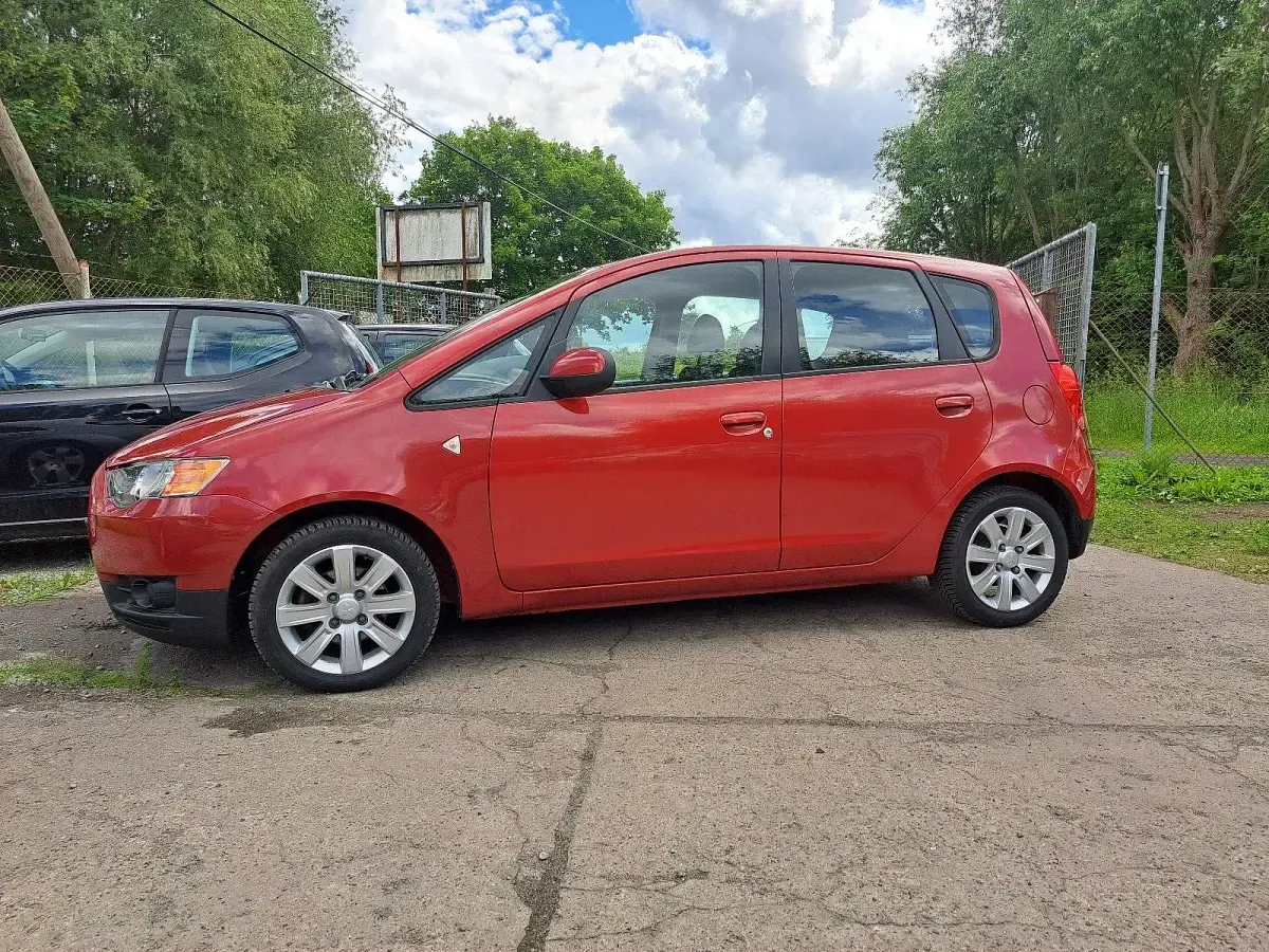 Gebraucht Mitsubishi Colt 95 PS (69 kW) 2013 Rot Kleinwagen